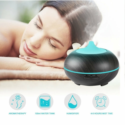 Woman relaxing with a diffuser on a white background