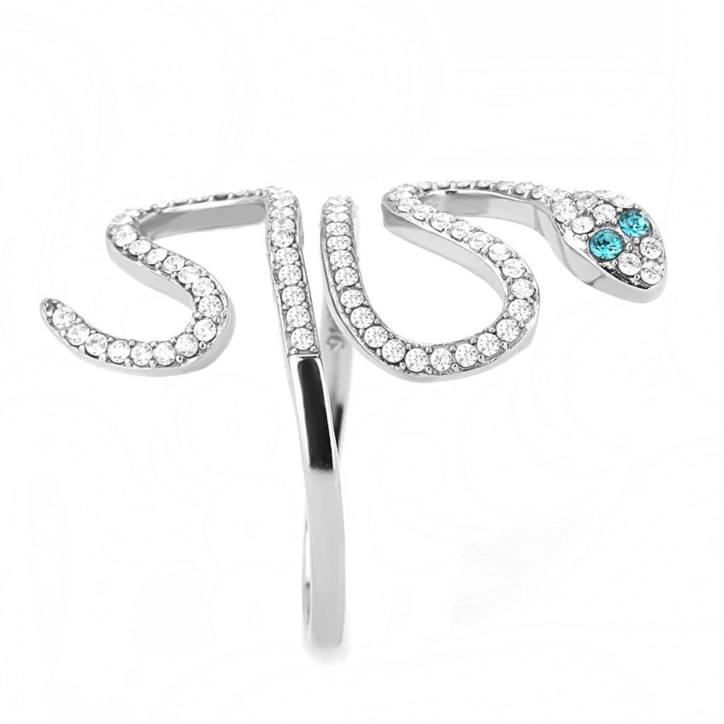 Silver ring with snake design and blue gemstone on a white background