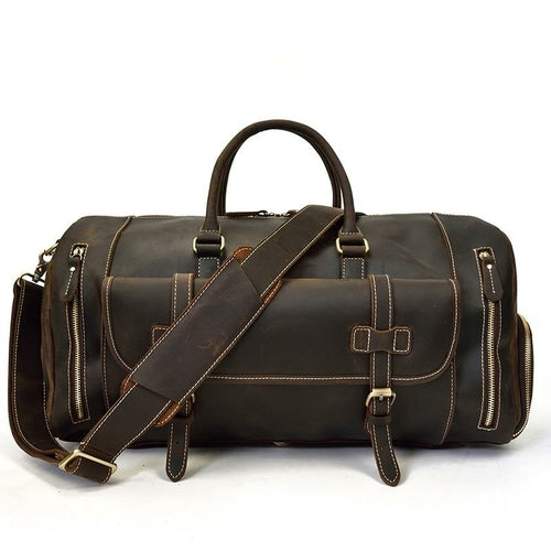 Dark Brown leather duffel bag with shoulder strap on a white background
