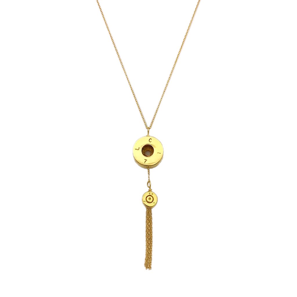 Gold necklace with circular pendants and a tassel on a white background