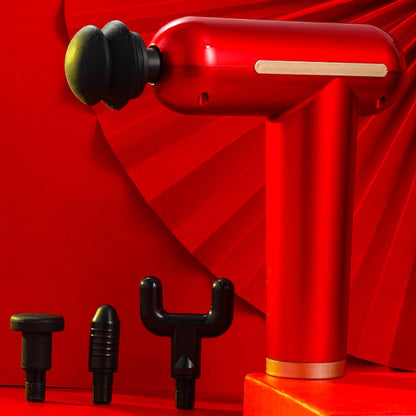 Red handheld tool with black attachments on a red background