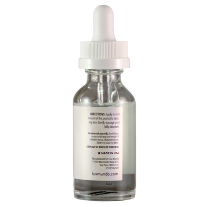 Clear glass bottle containing Hyaluronic Acid with dropper, and the Directions for use, labeled 'Luxmundo' on a white background.  