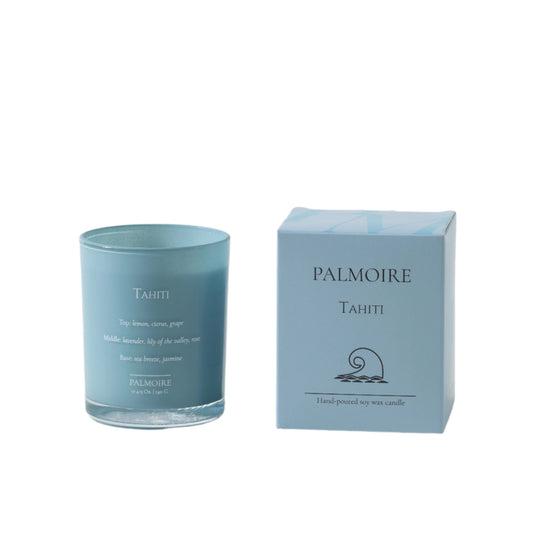 Blue candle and its packaging with 'Palmoire' branding on a white background