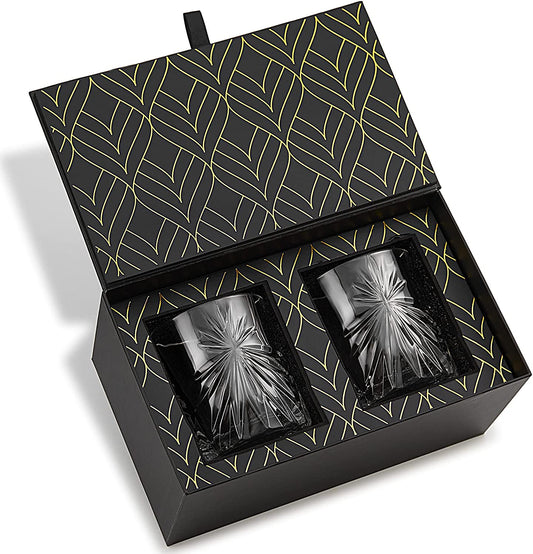 Two black glass tumblers in a decorative box with geometric pattern