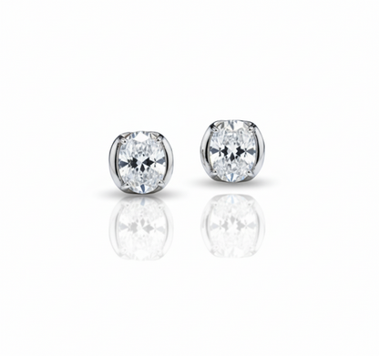 Flora Silver Stud Earrings on a white background