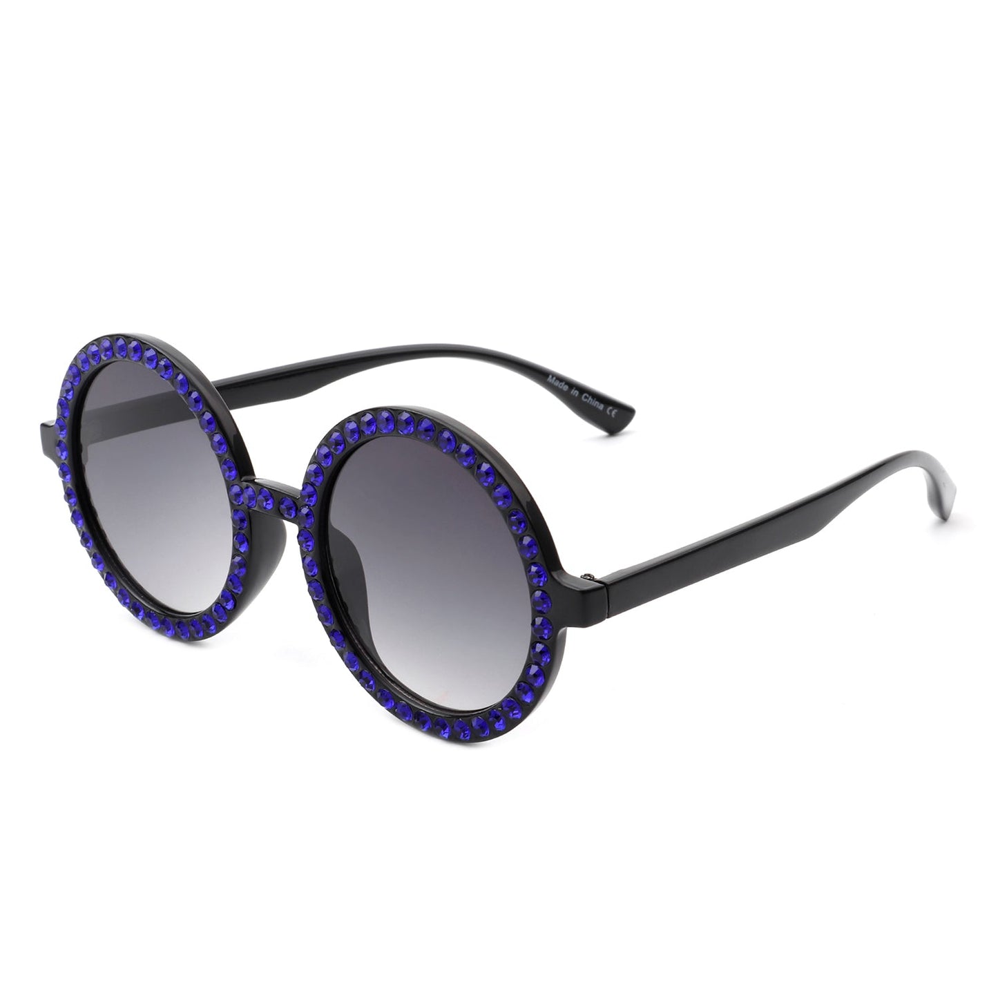 Sunglasses with blue gemstones on a white background