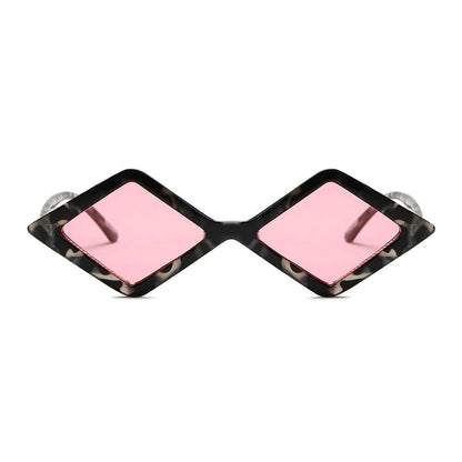 Sunglasses with pink lenses and tortoiseshell frame on a white background