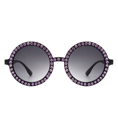 Sunglasses with pink gemstones on a white background