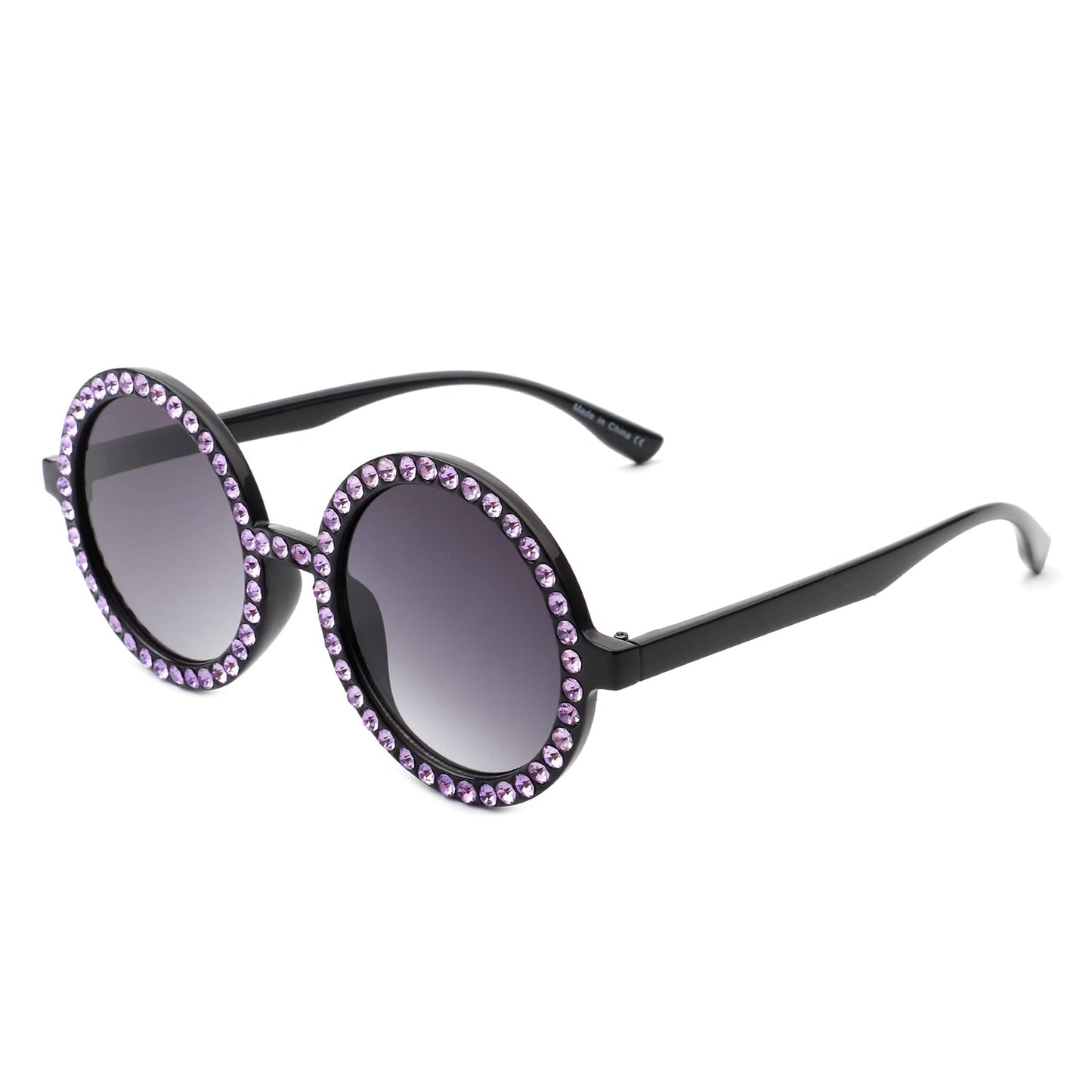 Sunglasses with purple gemstones on a white background