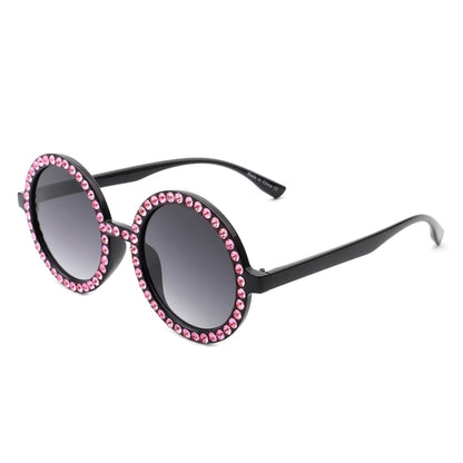 Sunglasses with pink gemstones on a white background