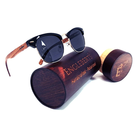 Sunglasses with wooden frame and case on a white background, featuring the brand 'Englebert'.