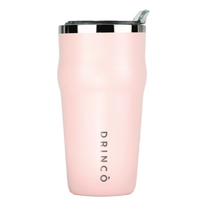 Pink insulated tumbler with silver lid on a white background