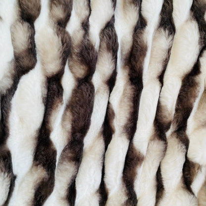 Close-up of fur fabric with brown and beige pattern