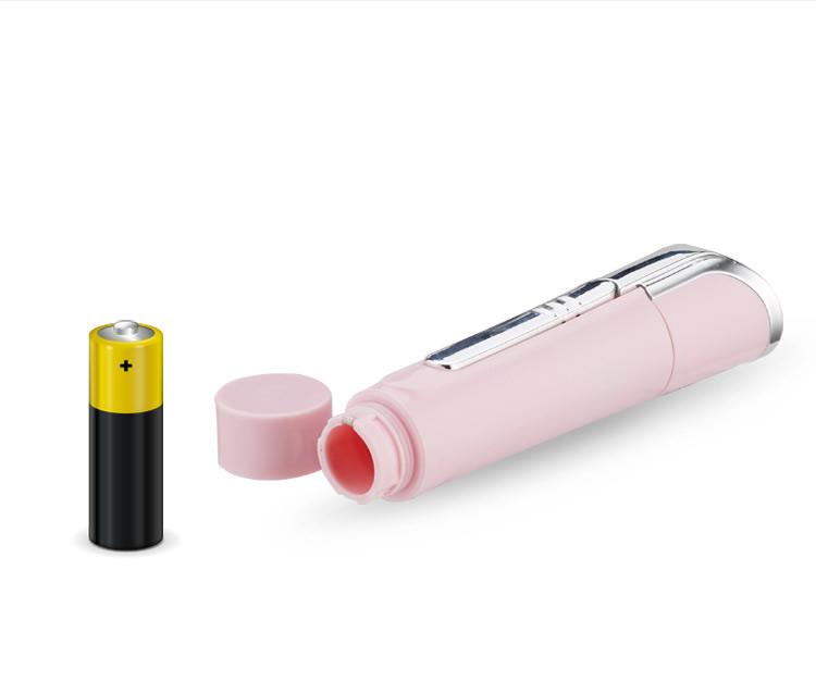 Pink ladies shaver with battery on a white background