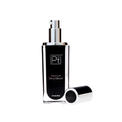 Serum bottle labeled 'Platinum Deluxe Serum' on a white background