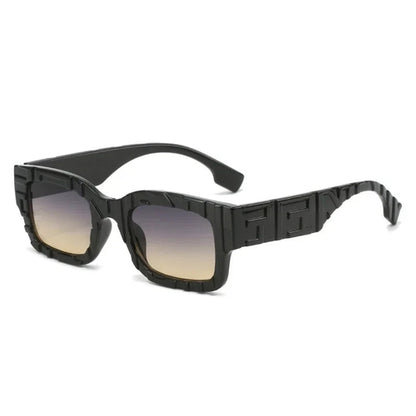 Black sunglasses with a gradient lens on a white background