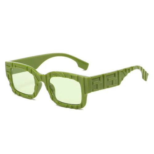 Green sunglasses with a geometric frame on a white background