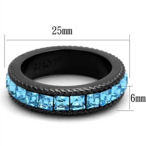 Black ring with blue gemstones and measurements on a white background