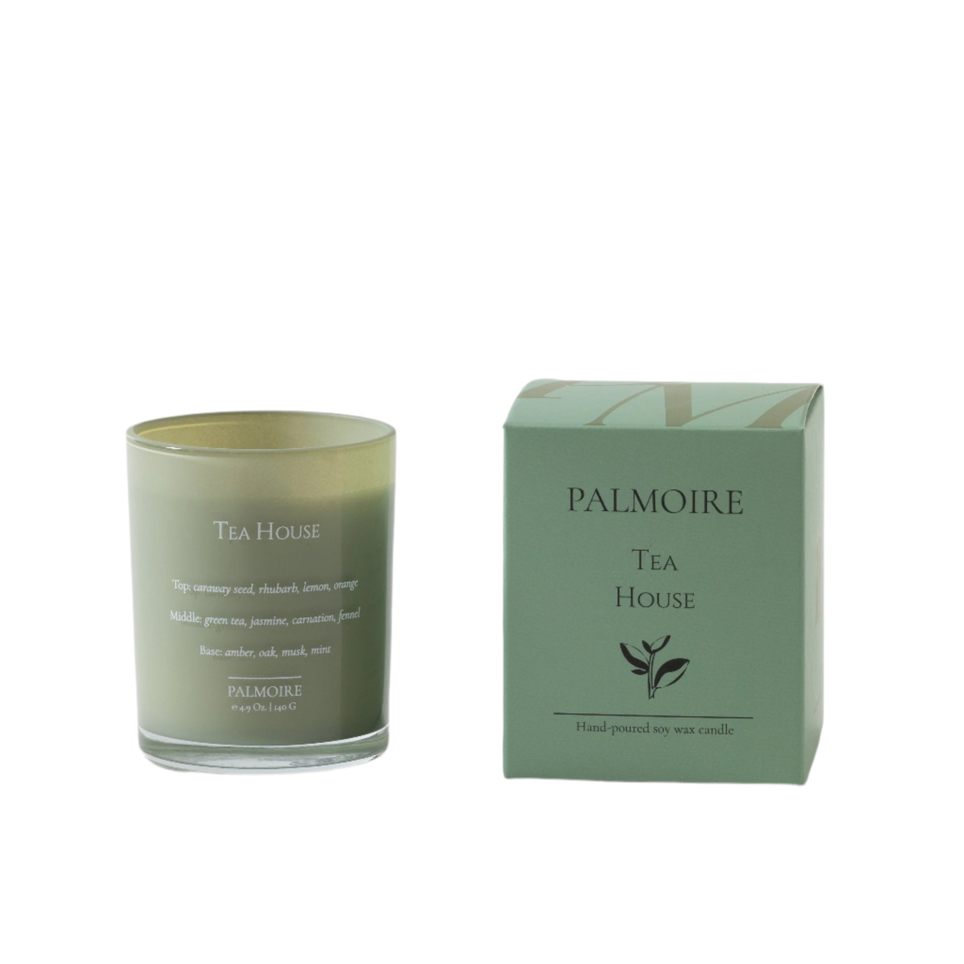Green soy wax candle labeled 'Tea House' by Palmoire next to its packaging on a light gray background