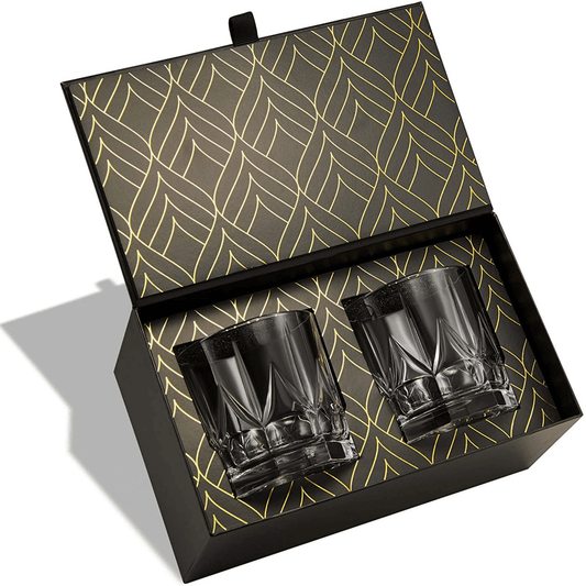 Two black glass tumblers in a decorative box with geometric pattern