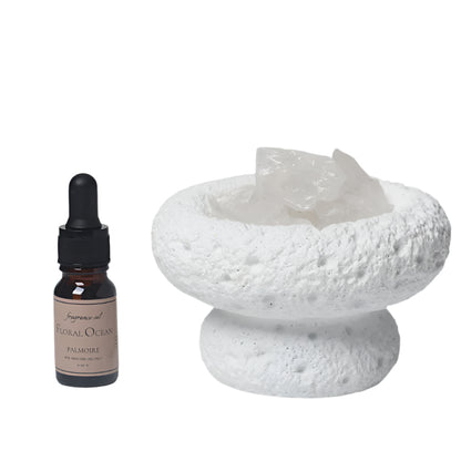 White Moon Diffuser and Floral Ocean fragrance. and a white ceramic bowl with Moon Quartz on a white background