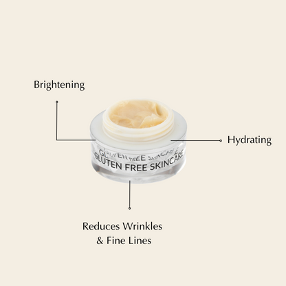 Jar of skincare cream with text indicating benefits on a beige background