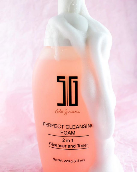 Bottle of Solo Giovanne Perfect Cleansing Foam on a pink background