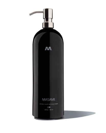 Black bottle with pump dispenser on a white background