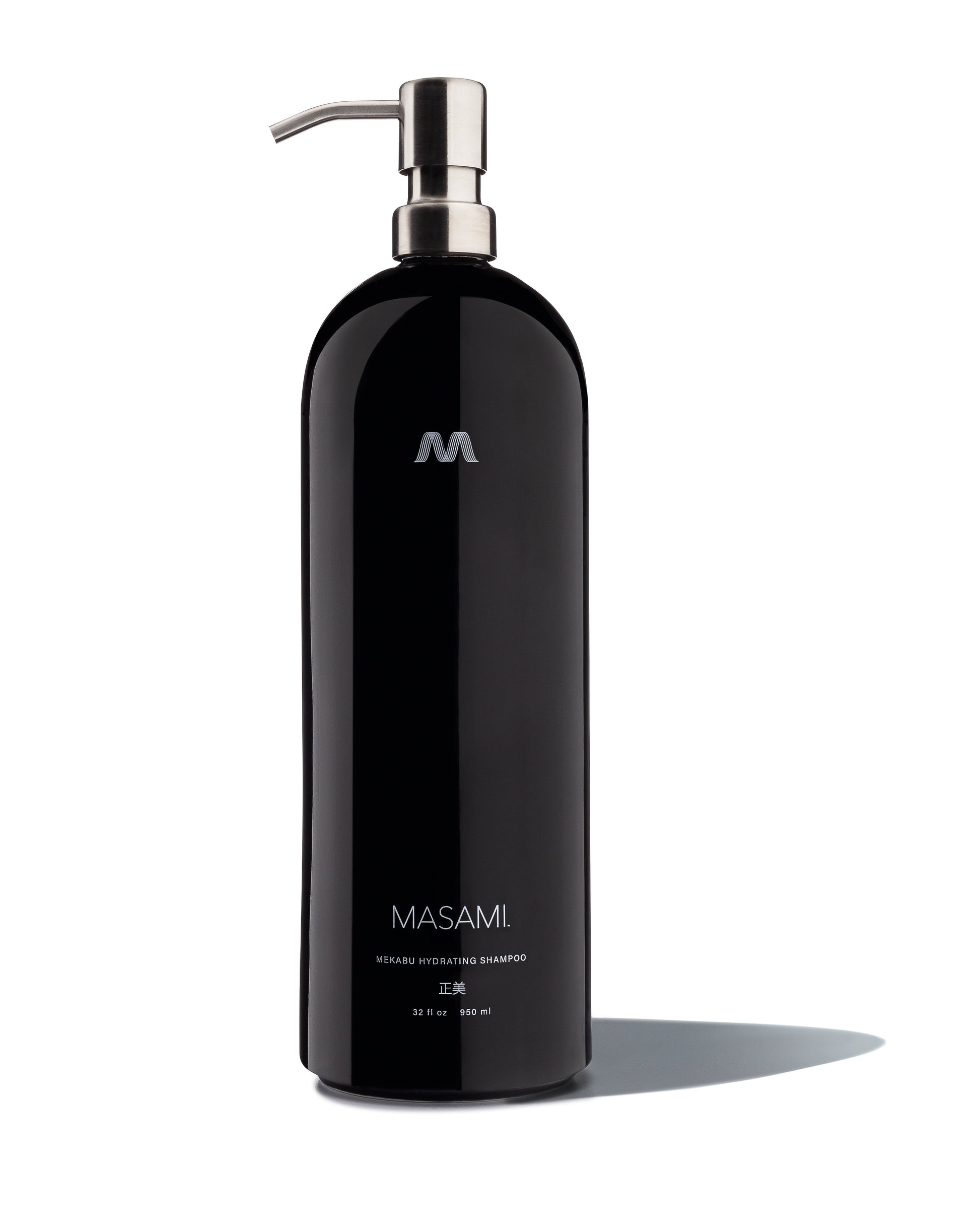 Black shampoo bottle with pump dispenser on a white background