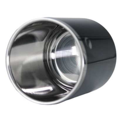 Metallic cylindrical object with reflective surface on a white background