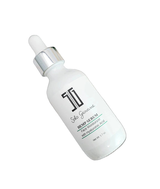 5G Solo Giovanne Skincare serum bottle on a marble surface with green leaves