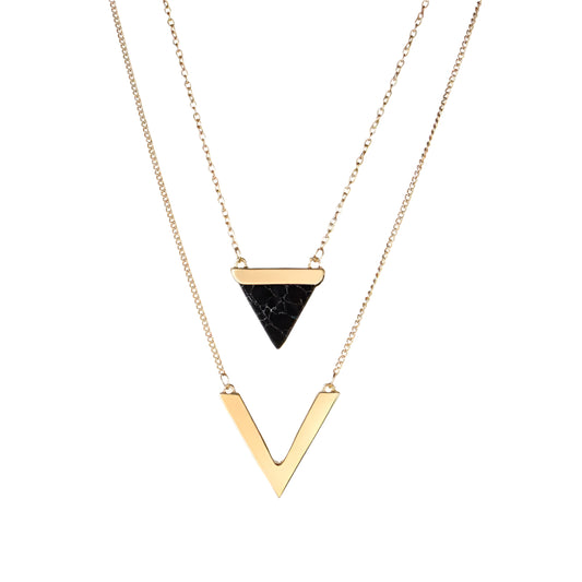 Gold necklace with geometric pendants on a white background