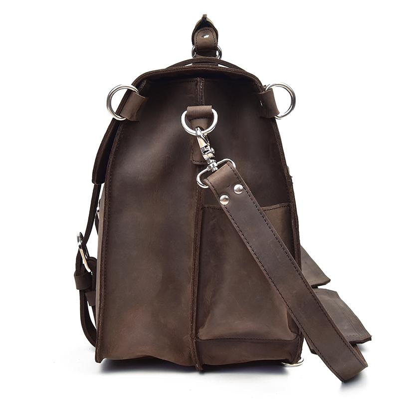 Brown leather backpack with a shoulder strap on a white background
