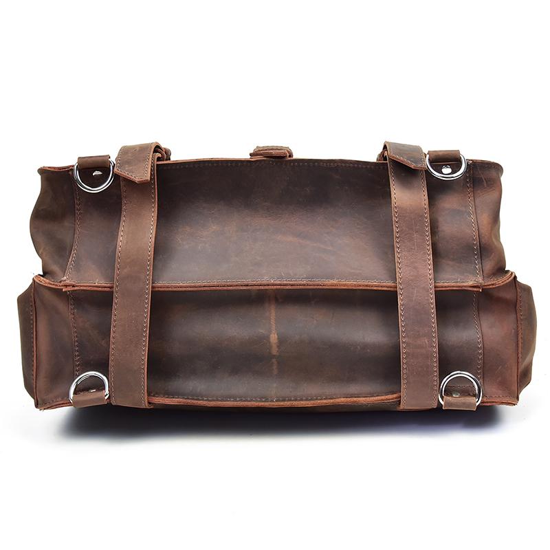 Brown leather duffel bag on a white background