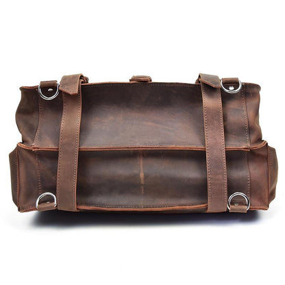 Brown leather duffel bag on a white background