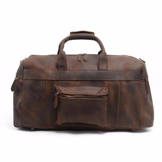 Brown leather duffel bag on a white background