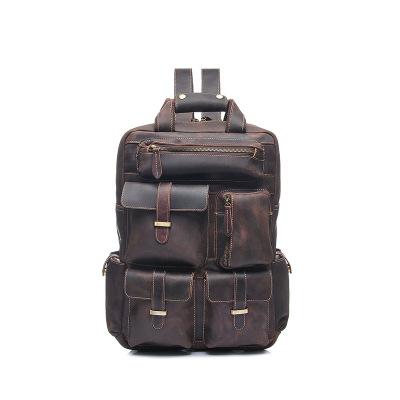 Brown leather backpack on a white background