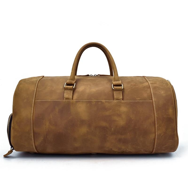 Brown leather duffel bag on a white background
