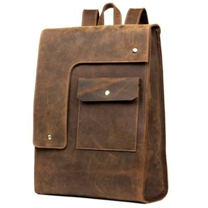 Brown leather backpack with two front pockets on a white background