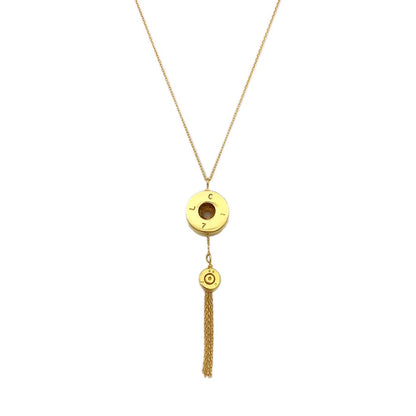 Gold necklace with circular pendants and a tassel on a white background